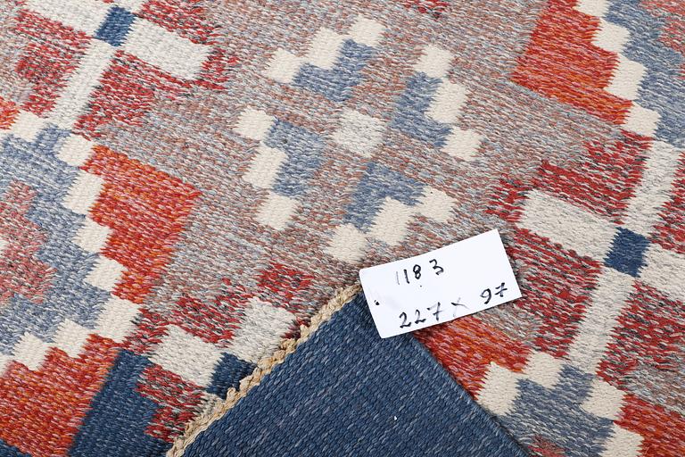 Erik Lundberg, a flat weave carpet, Vätexvaregården, Sweden, c. 227 x 97 cm.