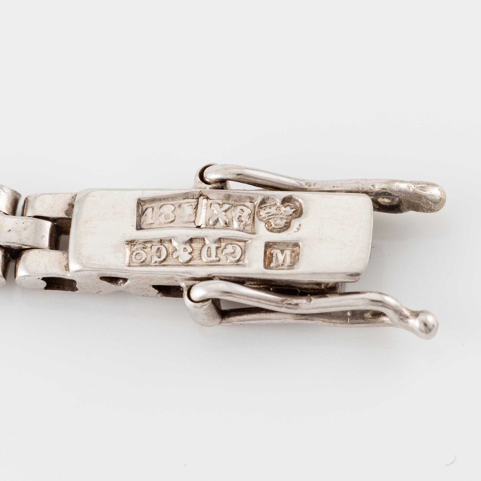 A bracelet 18K white gold with ruby and brilliant-cut diamonds. Malmö 1948.