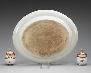 A armorial serving dish and two custard cups with covers, Qing dynasty, Qianlong (1736-95).