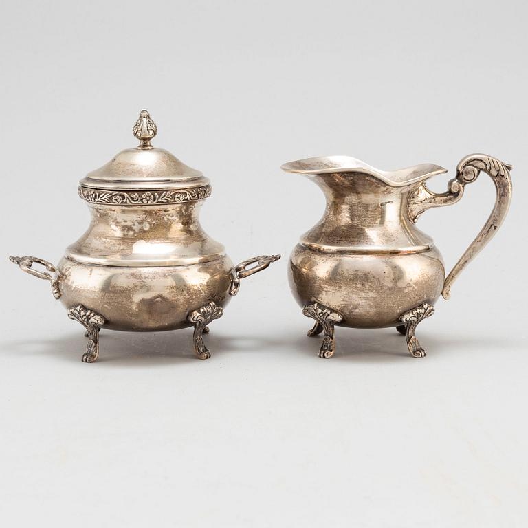 A silver creamer and a sugar bowl, Egypt, 20th century.