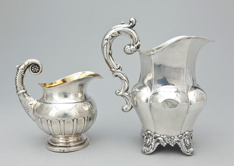 GRÄDDKANNOR, 2 st, silver, bl.a. Anders Lundqvist Stockholm 1839. Total vikt ca 230 gram.