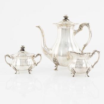 A silver coffee pot, a sugarbowl and a creamer, Swedish import marks, 20th Century.
