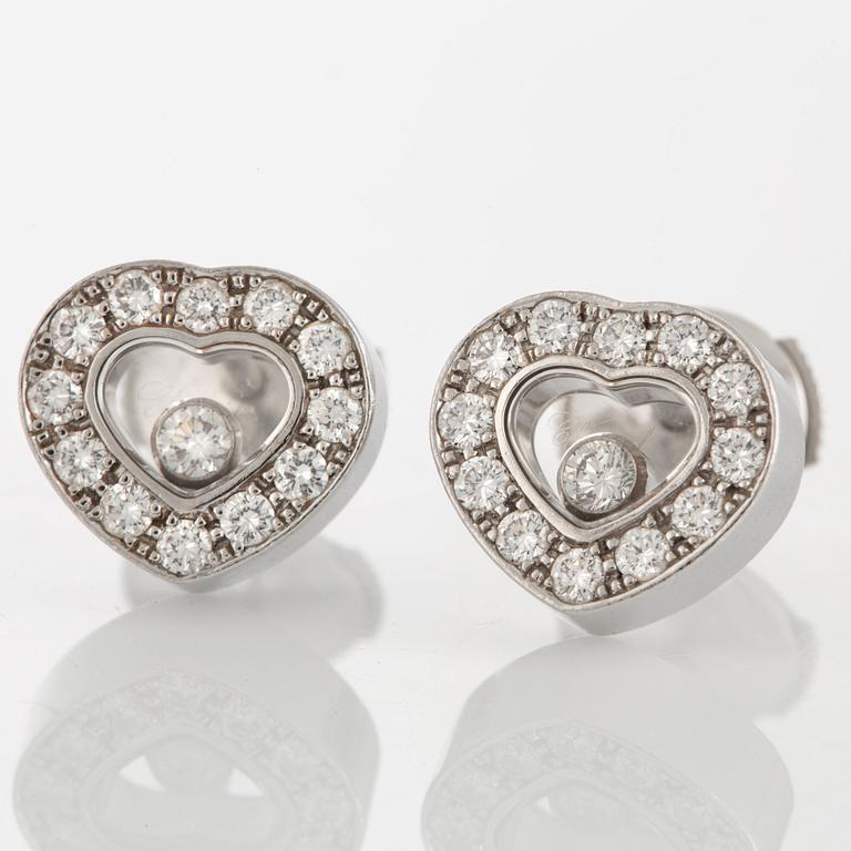 A pair of Chopard "Happy diamonds" earrings in 18K white gold with round brilliant-cut diamonds.