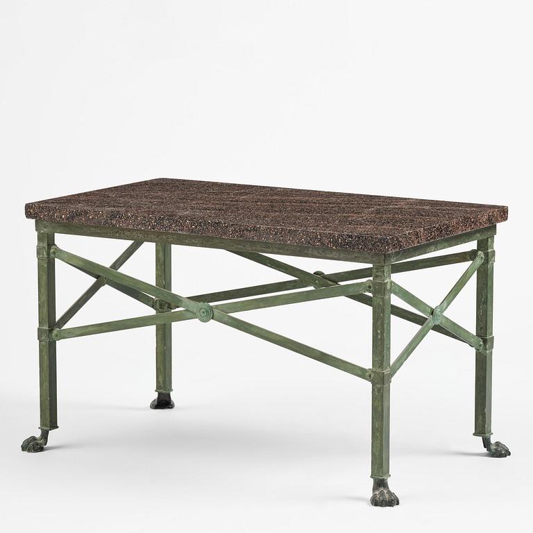 A table with Swedish 'Orrlok' porhyry top, early 19th century on a later bronze stand.