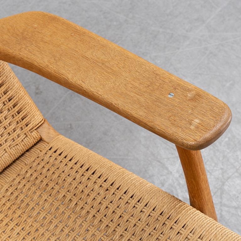 A 'CH-25' armchair designed by Hans J Wegner for Carl Hansen & Søn, Denmark.