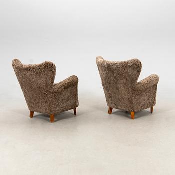 Armchairs, a pair from the 1940s.