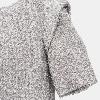 Chanel, a bouclé silver dress, size 34.