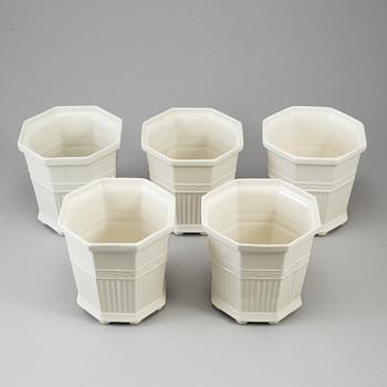 Five porcelain flowerpots by Prins Eugen.
