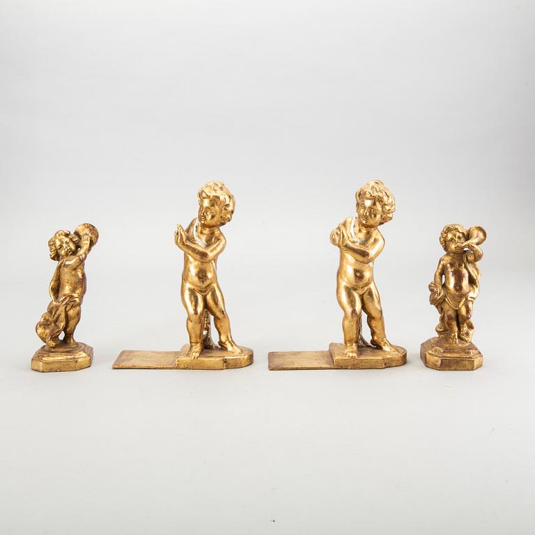 Seven mid 20th century wooden figurines and book ends by Poaletti Firenze Italy.