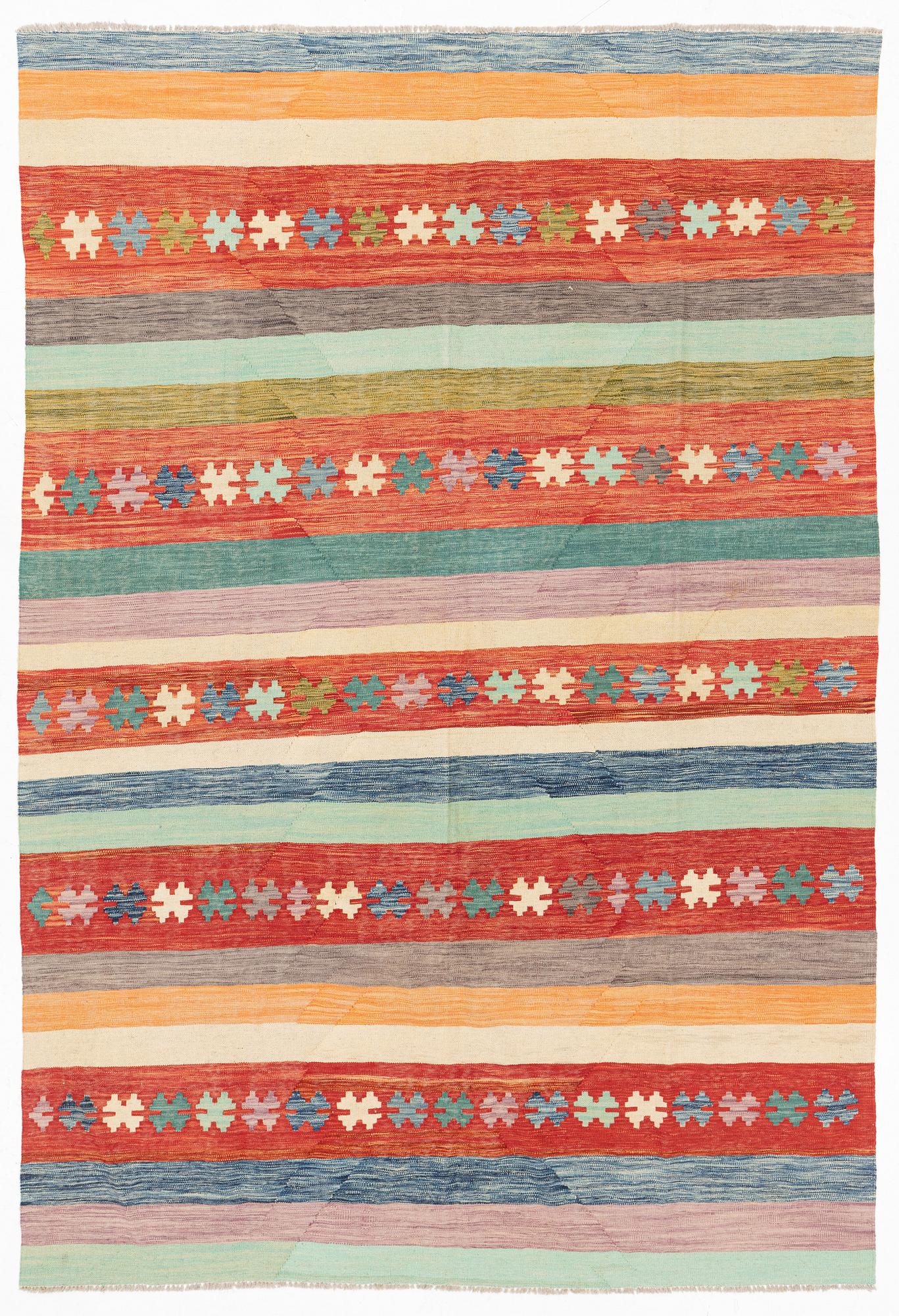 A kilim rug, ca 298 x 208 cm.