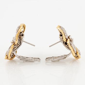 A pair of earrings in 18K gold and white gold set with old-, round brilliant and eight-cut diamonds.