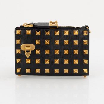 Valentino Garavani, a leather and studs wallet.