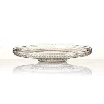 A cut glass punch bowl with cover, stand and ladle, Empire, first part of the 19th century.