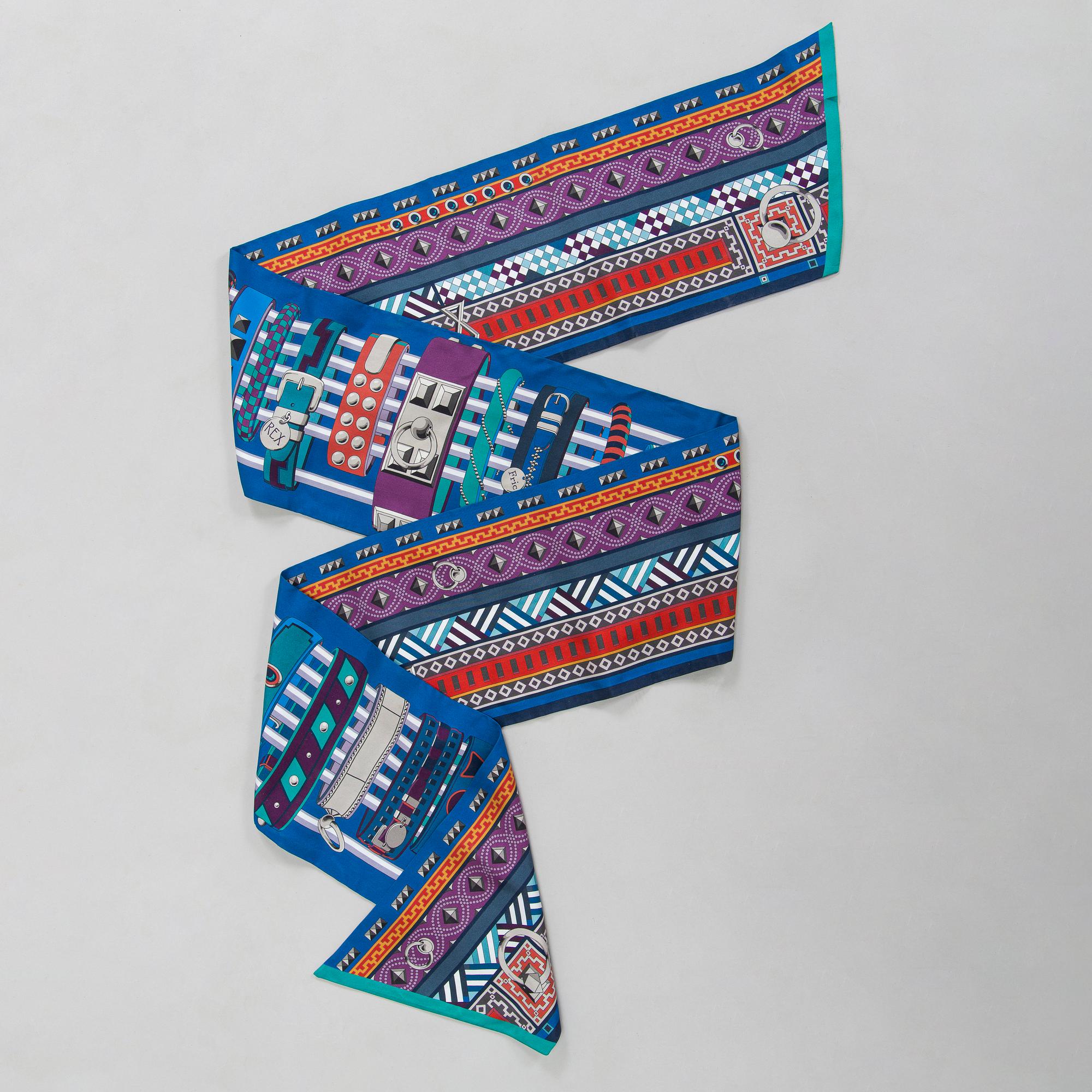 Hermès, a 'Collier de Chiens Maxi Twilly' silk scarf.