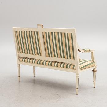 A Gustavian style sofa, early 20th century.