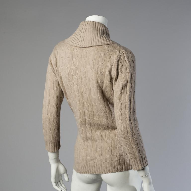 Three sweaters by Ralph Lauren.