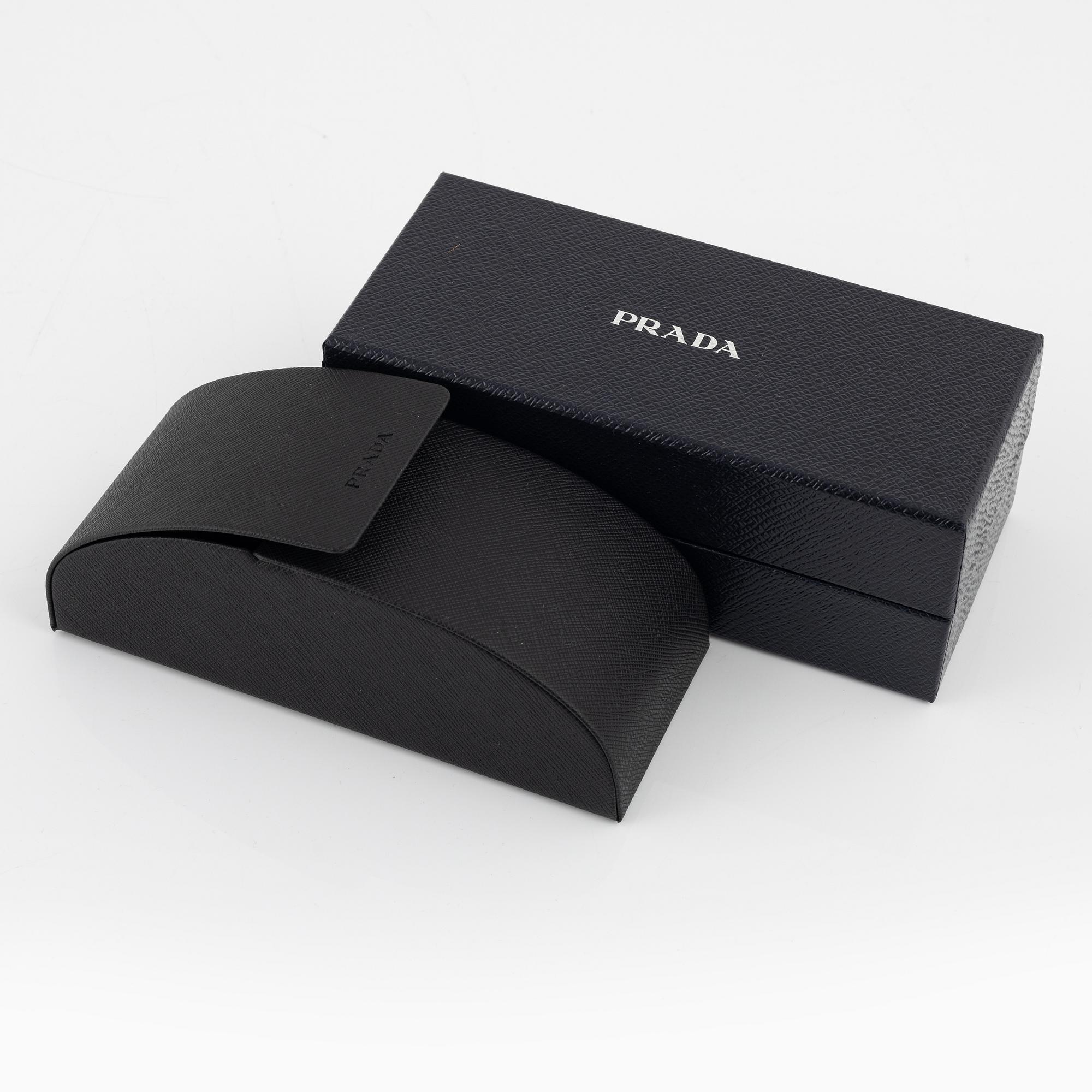 Prada, sunglasses.