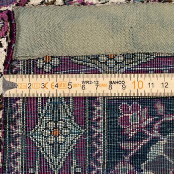 An antique silk Kashan rug, Central Persia, c. 207 x 131 cm.