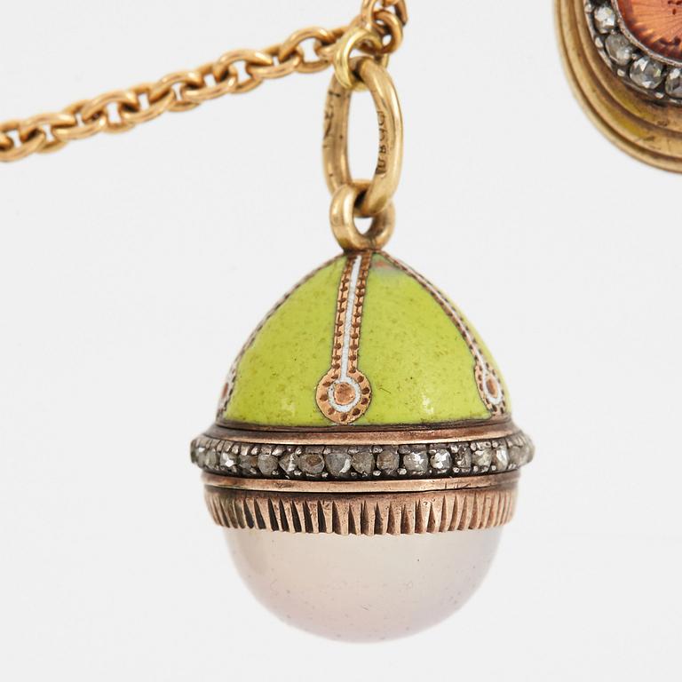 A FABERGÉ  GOLD Chain Necklace WITH 8 GOLD, ENAMEL ETC MINIATURE EASTER EGG PENDANTS, S.T PETERSBURG and 3 other.