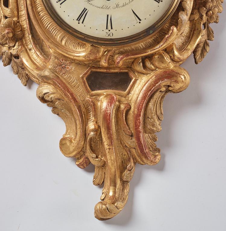 A Swedish Rococo 18th Century wall clock by J. Hovenschiöld.