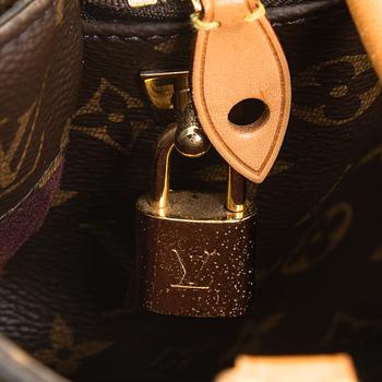 Louis Vuitton, a Monogram Canvas 'Montaigne GM' bag.