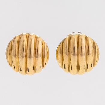 A pair of 18K gold earrings.