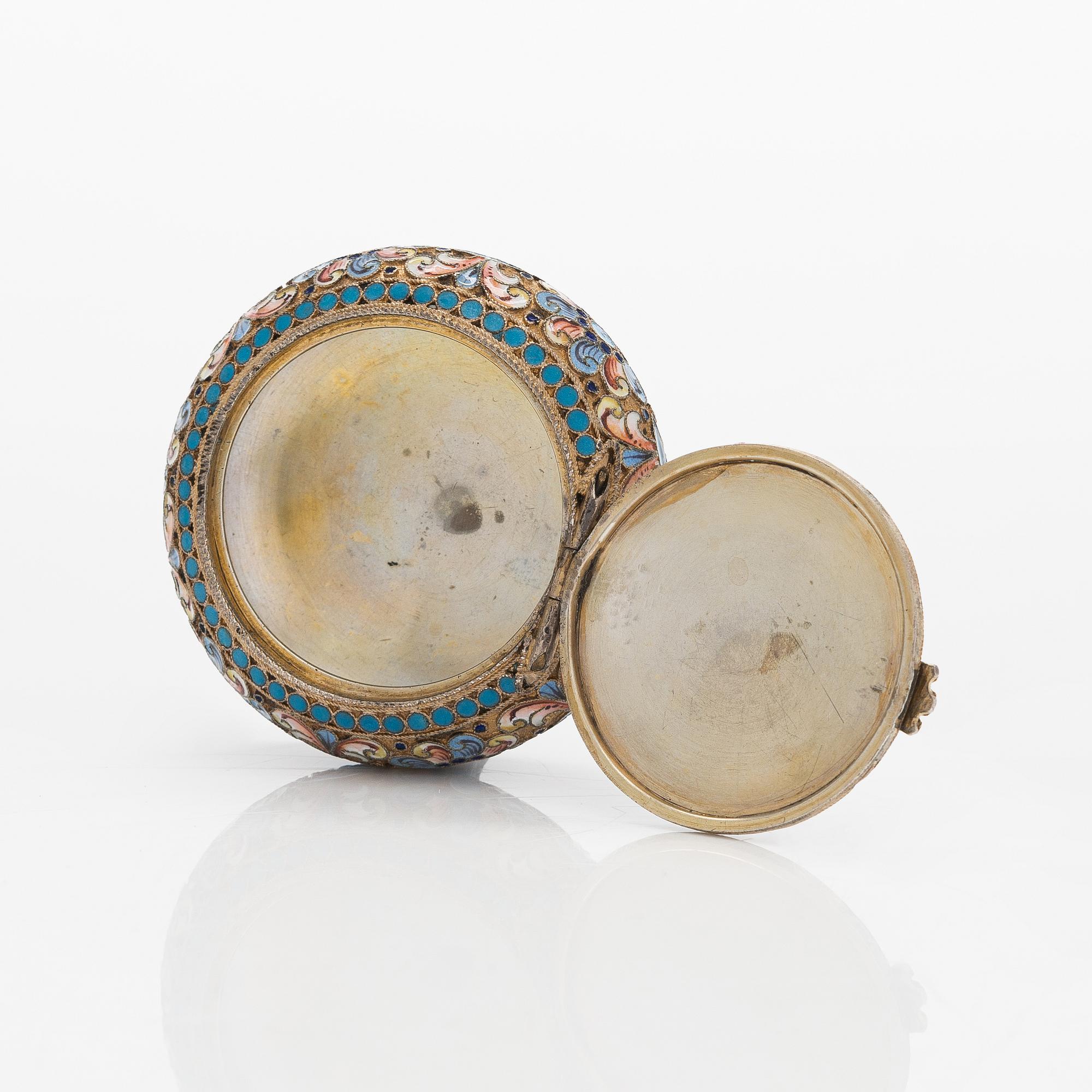 A gilt silver cloisonné enamel pill box, maker's mark of D. Nikitin, Moscow 1908-17.
