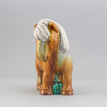 Gunnar Nylund, a stoneware sculpture of a work horse for Rörstrand signed.