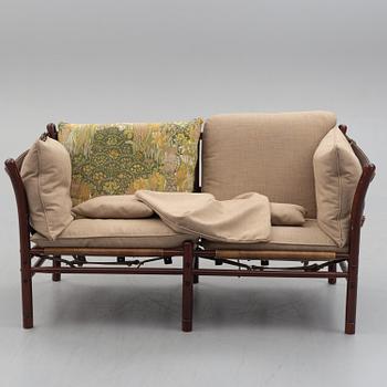 ARNE NORELL, an 'Ilona' stained wood and leather sofa fron Norell Möbel, Aneby, 1960's/70's.