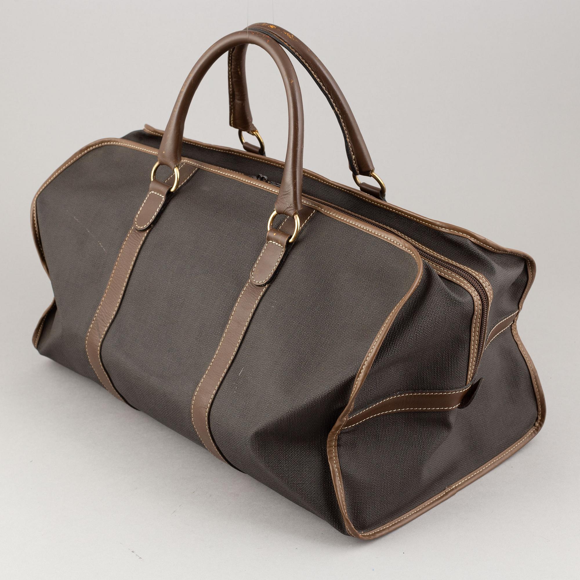 Dunhill, a coated canvas weekendbag.