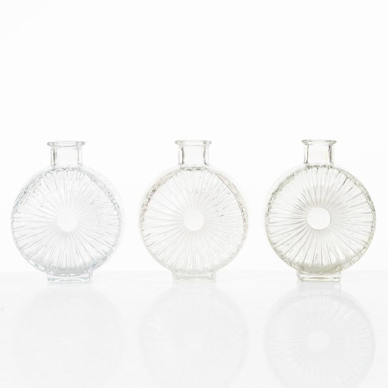 Helena Tynell, six 'Sun bottle' glass flasks, Riihimäen Lasi Oy. Manufactured between 1964-74.