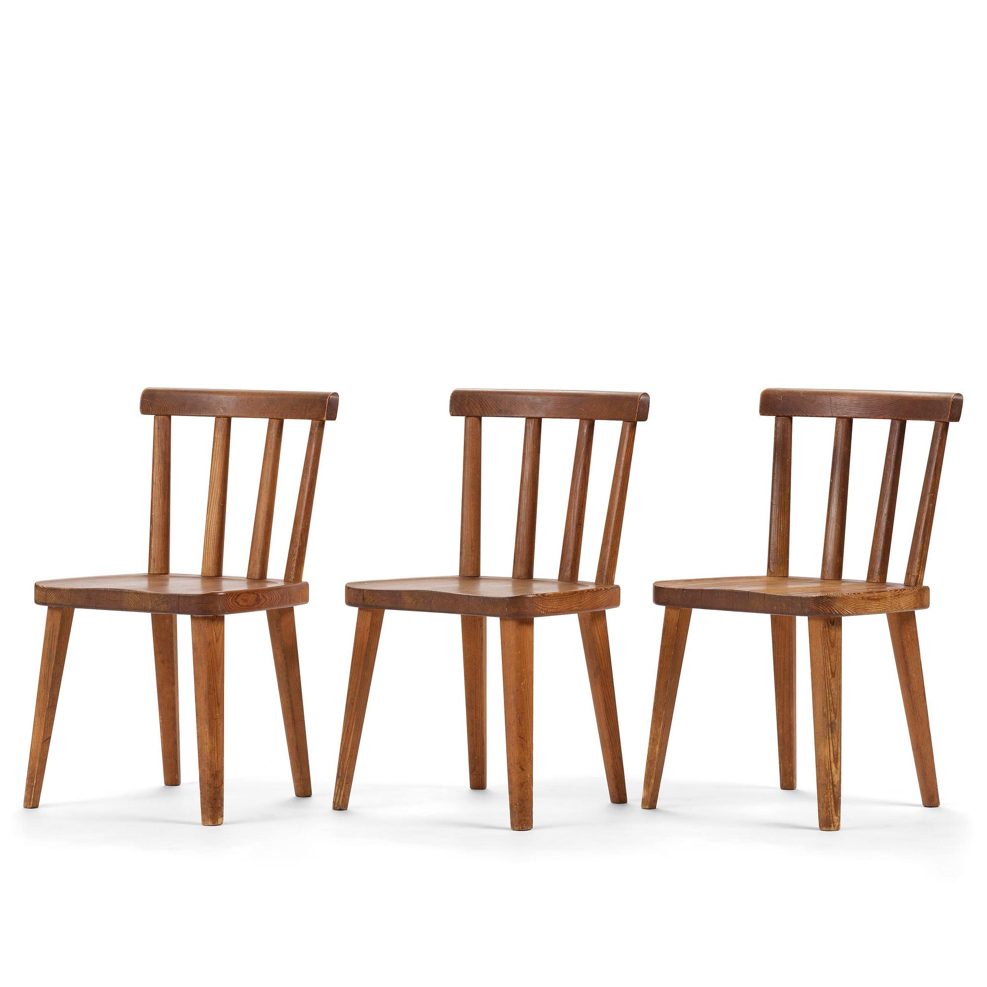 Axel Einar Hjorth, a set of three stained pine "Utö" chairs, Nordiska Kompaniet, Sweden, 1930s.