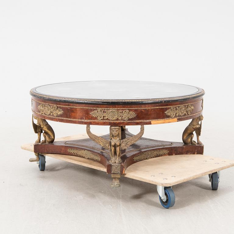 A walnut Empire style coffee table 20th century.