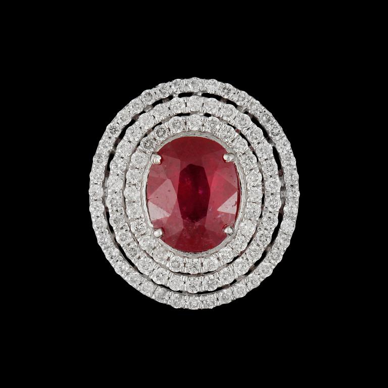 A ruby, circa 3.78 cts, and diamond, circa 0.92 ct, ring.