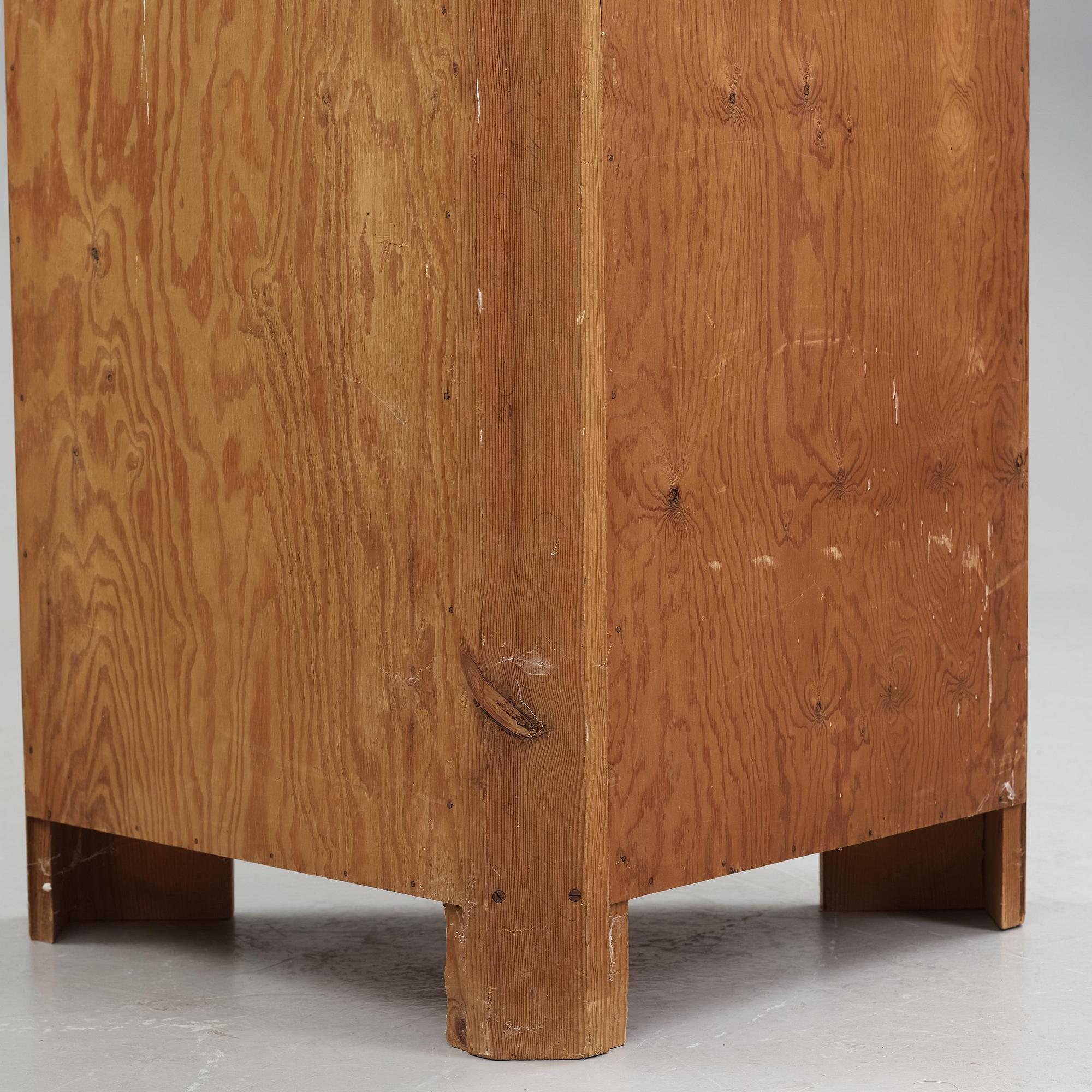 Axel Einar Hjorth, a stained pine "Utö" corner cabinet, Nordiska Kompaniet, Sweden, 1930s.