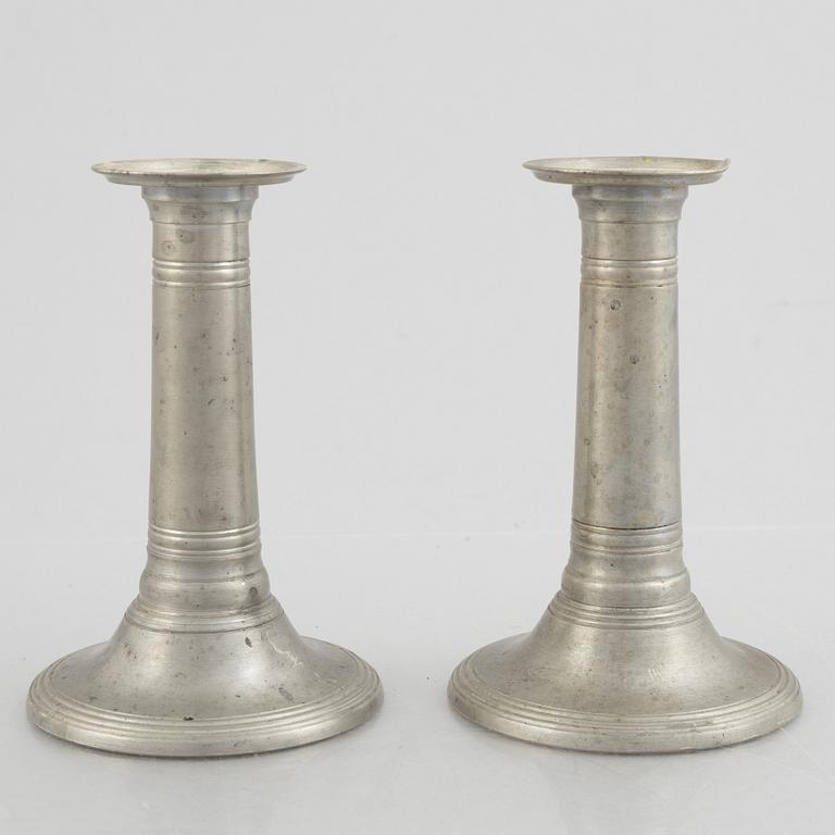 A pair of pewter candle sticks, model A702, Firma Svenskt Tenn, Sweden, 1928.
