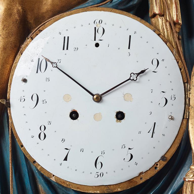 A Swedish Empire early 19th century gilt wood wall clock.