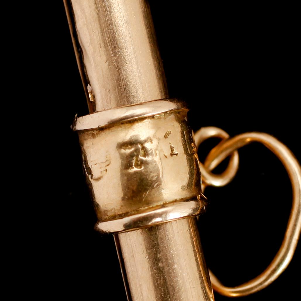 TANDPETARE, guld. Vikt 4 gram.