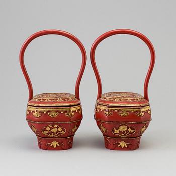 A pair of Chinese red lacquered baskets, early 20th Century.