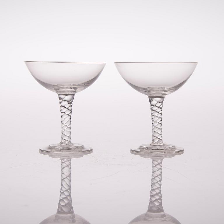 A set of twelve liqueur glasses from the first half of the 20th century.