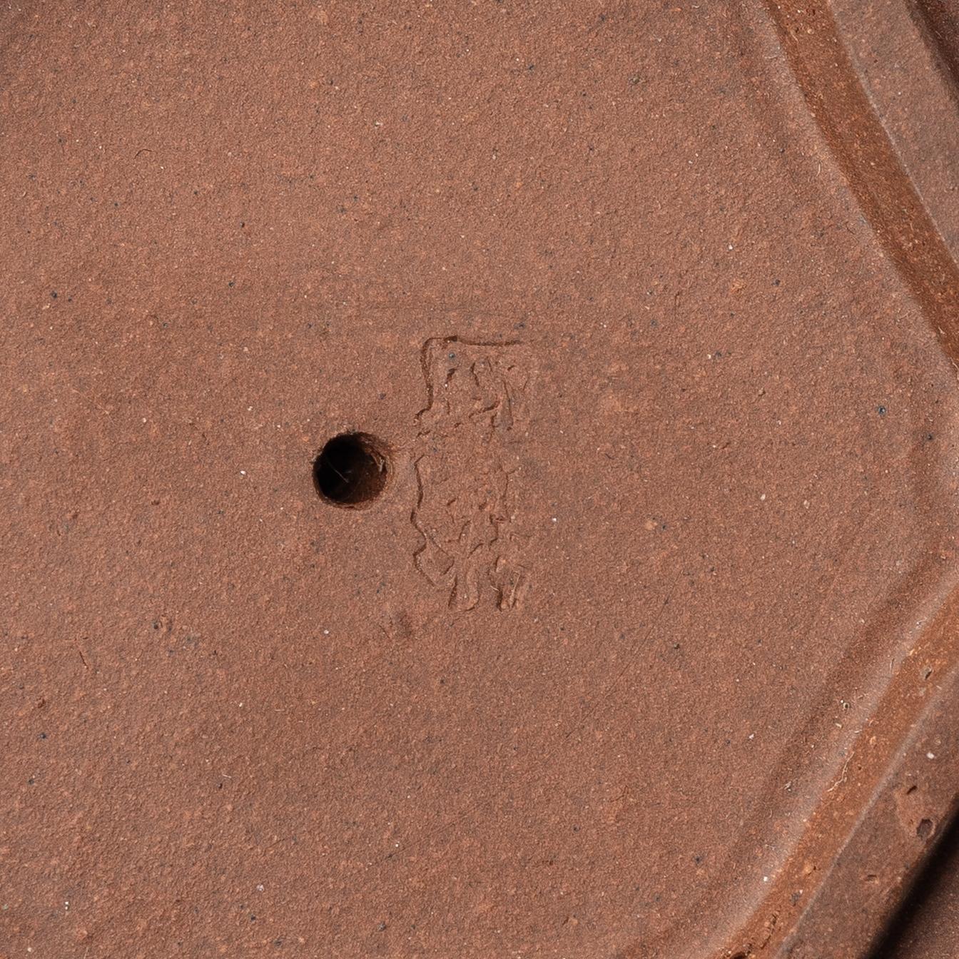 A group of three yixing teapots, China, 1980s.