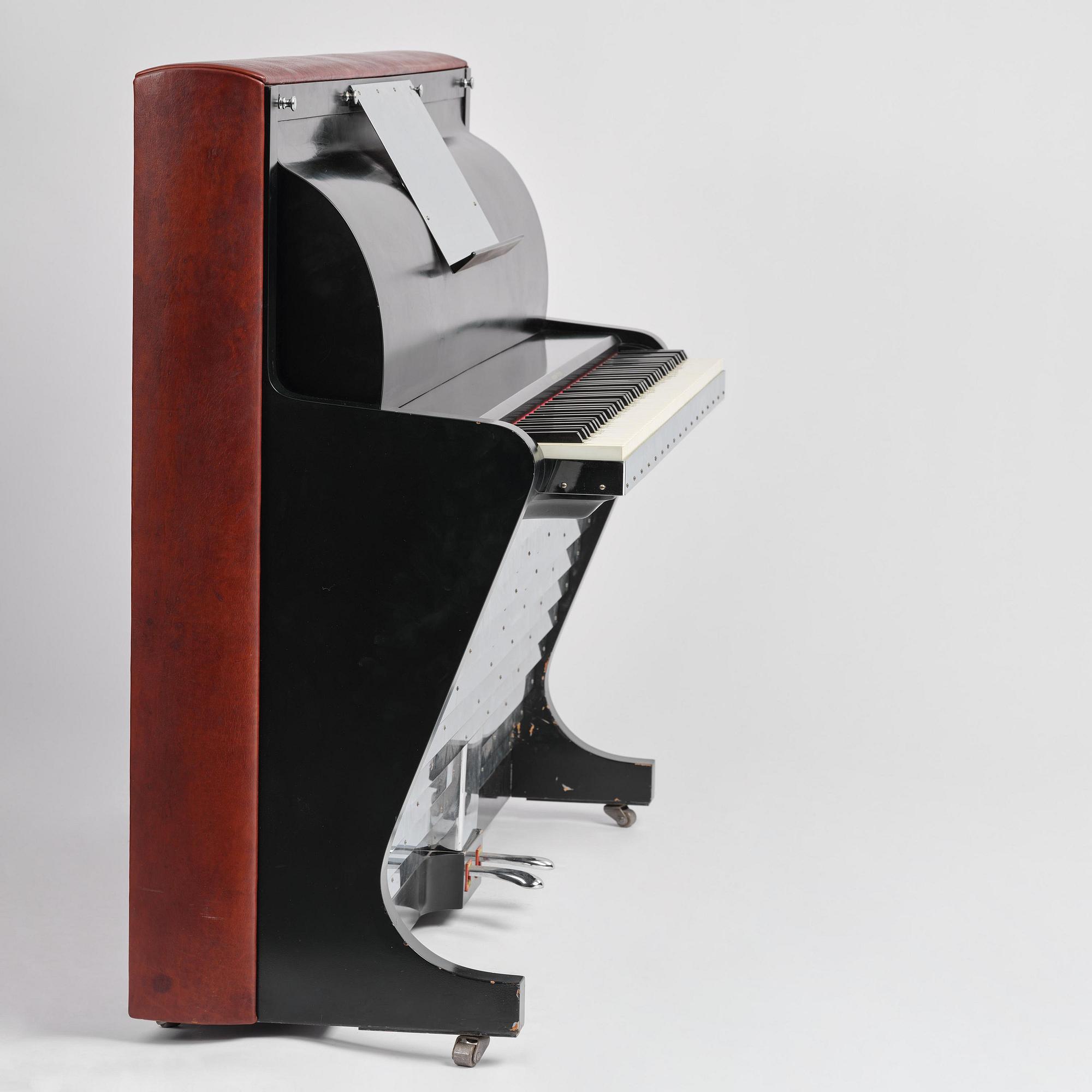 Poul Henningsen, a "PH Upright Piano", executed by Andreas Christensen, Denmark, 1940s.
