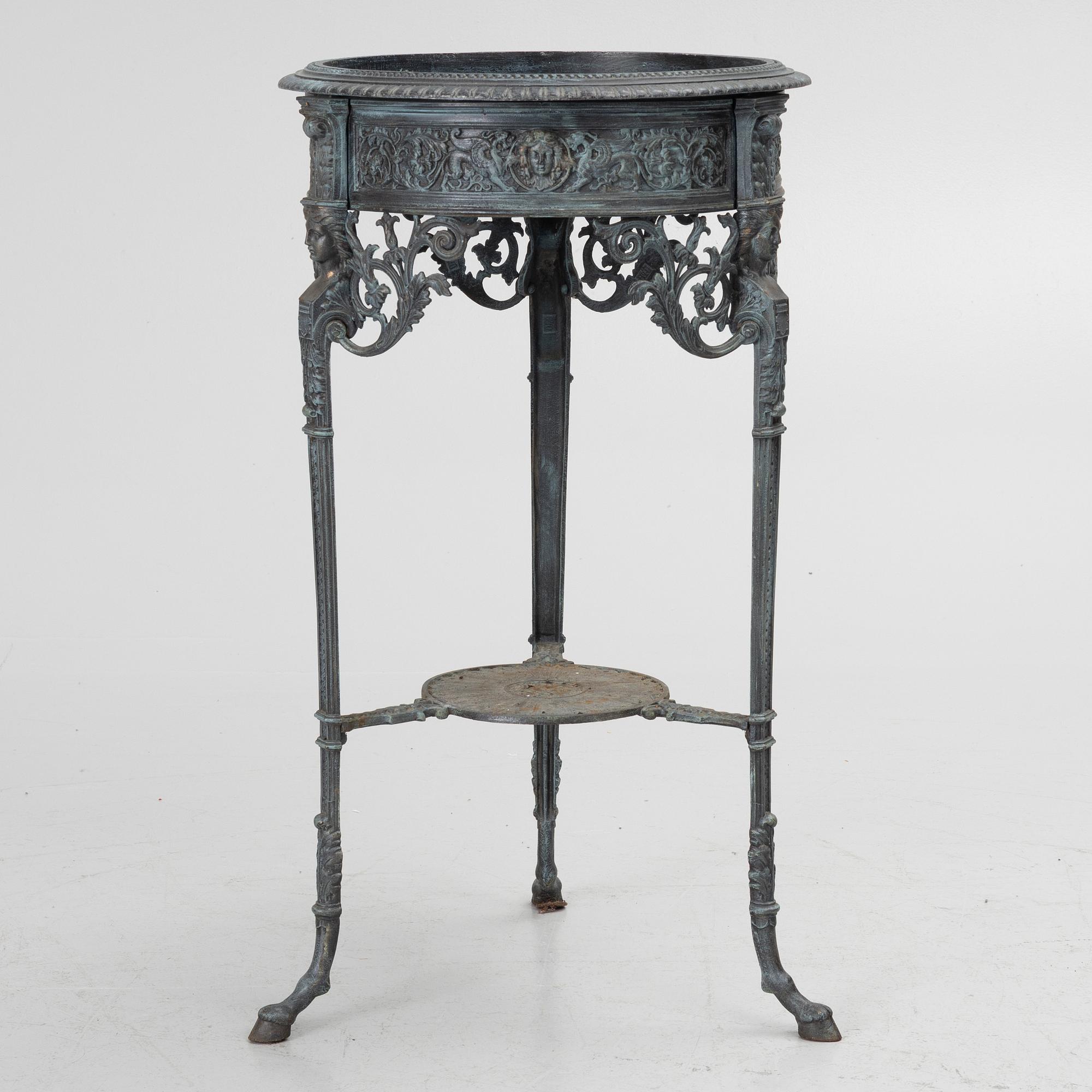 A plant stand, late 20th century.