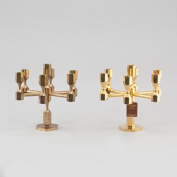 A pair of similar brass candelabras from Gusum, second half of the 20th century.