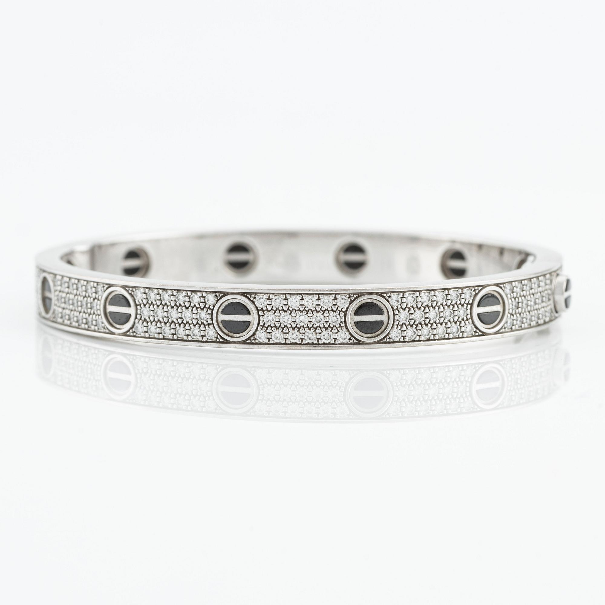 An 18K white gold Cartier bracelet "Love" with round brilliant-cut diamonds and ceramic.