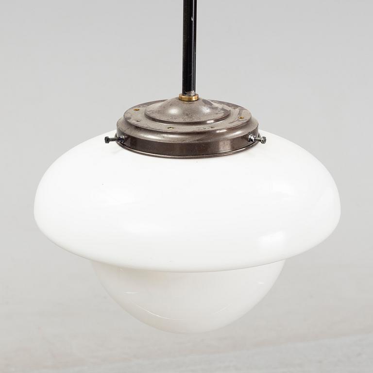 A pair of glass and patinated brass ceiling lights, Asea, 1930's.