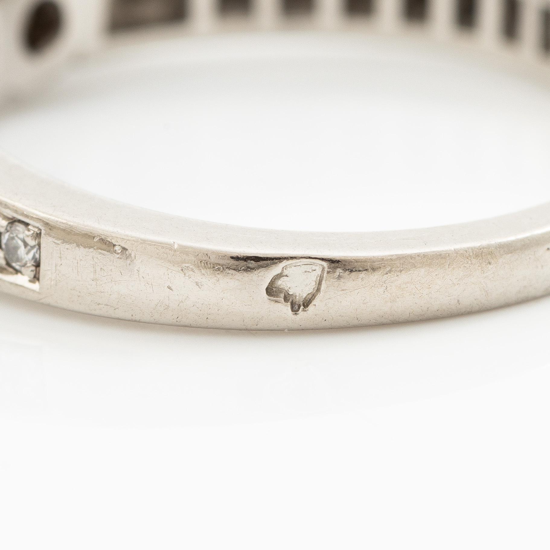 Cartier two rings platinum with round brilliant-cut diamonds.