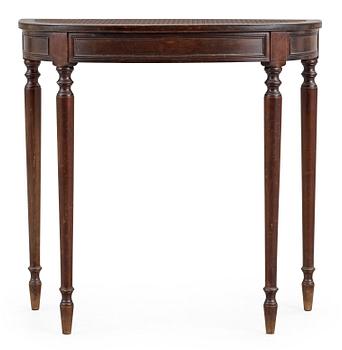 569. A stained birch console table, with rattan top, NK, Sweden 1920's.