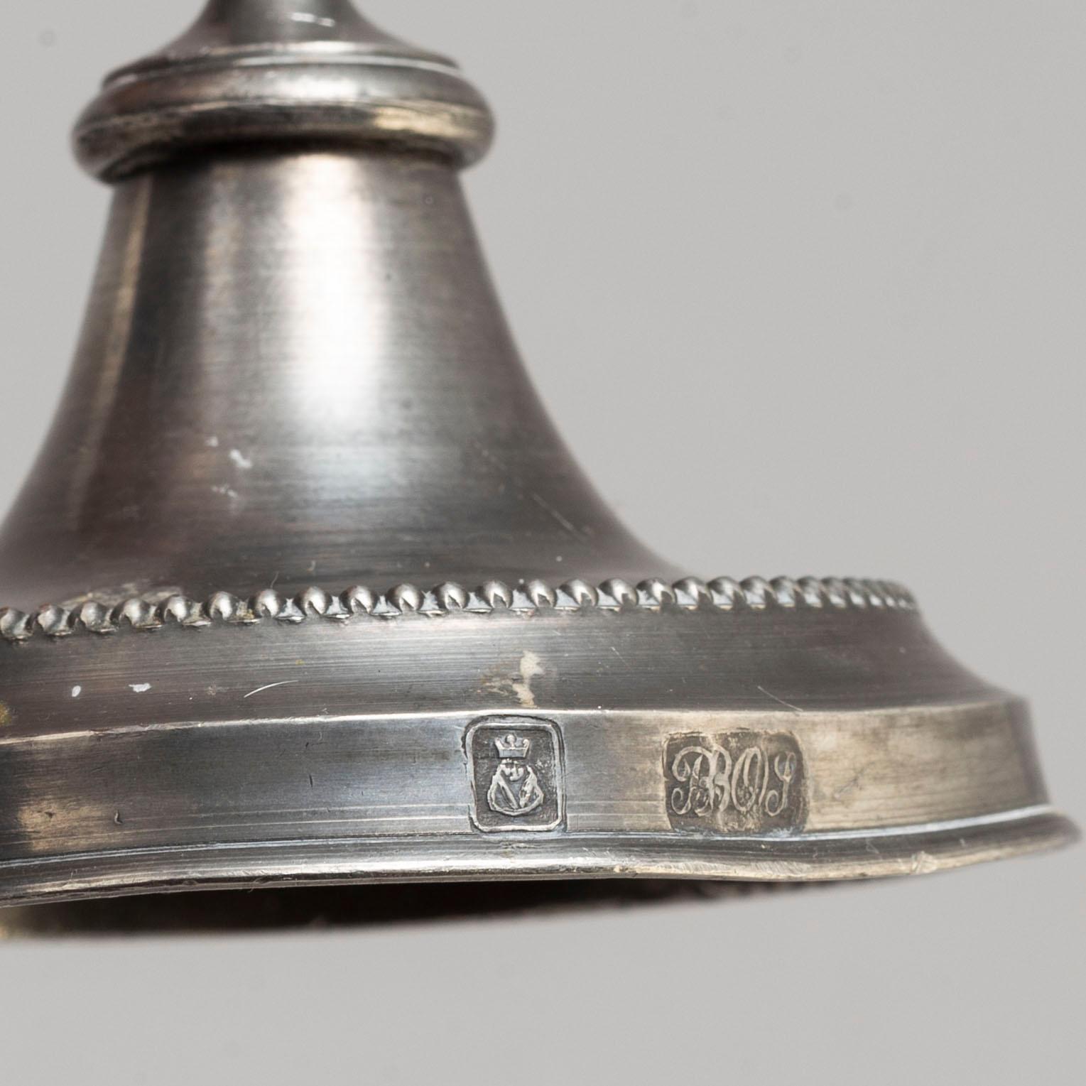 Two pair of Swedish pewter candlesticks, early 19th century and ca 1900.