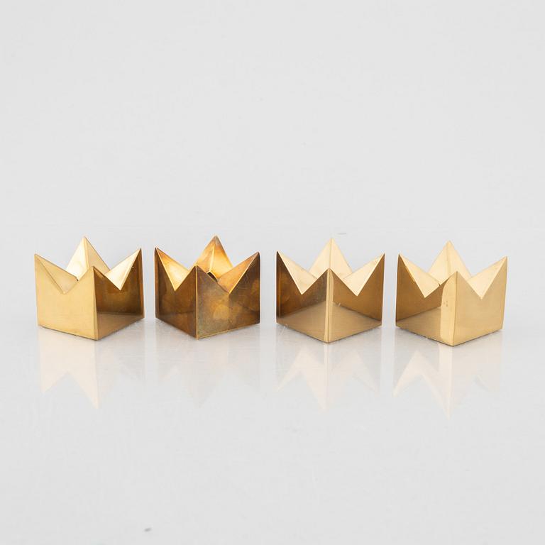 Pierre Forssell, four brass candle holders, Skultuna, Sweden.